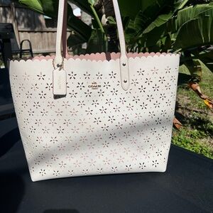 Coach laser cut pale pink tote